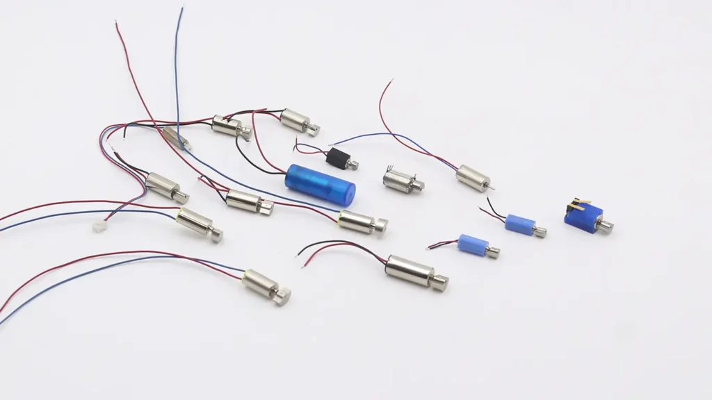 Miniature coreless vibration motors with various integration options including SMT reflow, spring contacts, and custom encapsulated designs for wearables and medical devices
