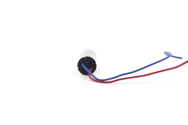 Rear view of 1020 coreless motor focusing on the black plastic end cap and secure wire outlets