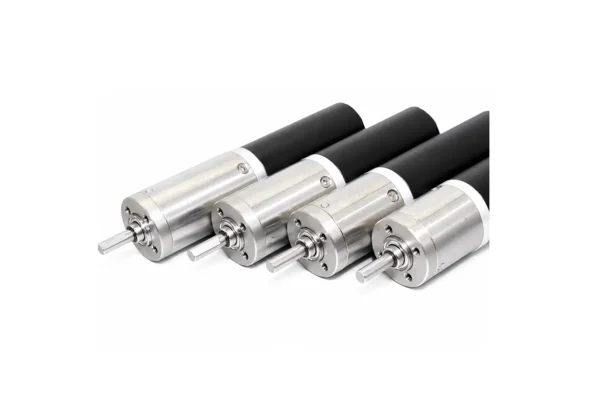 A row of four TSL-PG16-KW1636 16mm DC planetary gear motors showing the output shafts and silver metal gearboxes