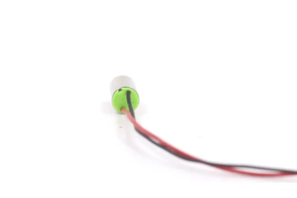 Rear view of 4mm coreless micro dc motor featuring a green end cap with pre-soldered red and black lead wires