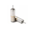 micro planetary geared electric motor 12v dc A 12V micro planetary geared electric motor standing vertically alongside another lying down, showcasing the coreless brushed DC motor design and D-cut output shaft