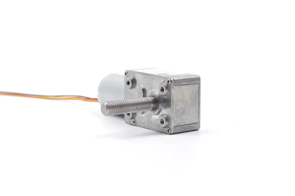 Bottom view of right-angle DC motor with lead screw showing M2 mounting holes