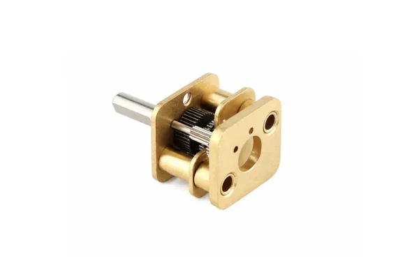 High-precision micro spur gearbox showing the mounting face plate and internal brass gears