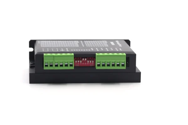 DM556 stepper motor driver terminal blocks and DIP switches close-up